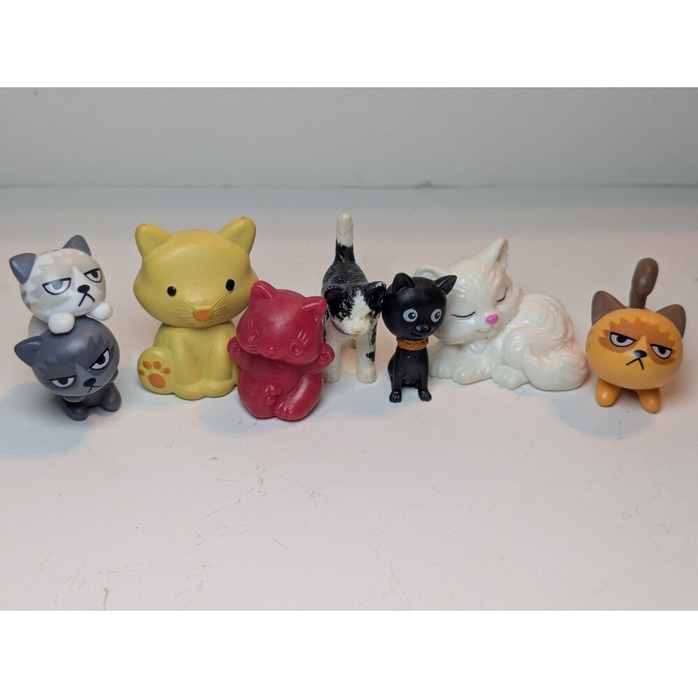 7 Plastic Cat Figurines